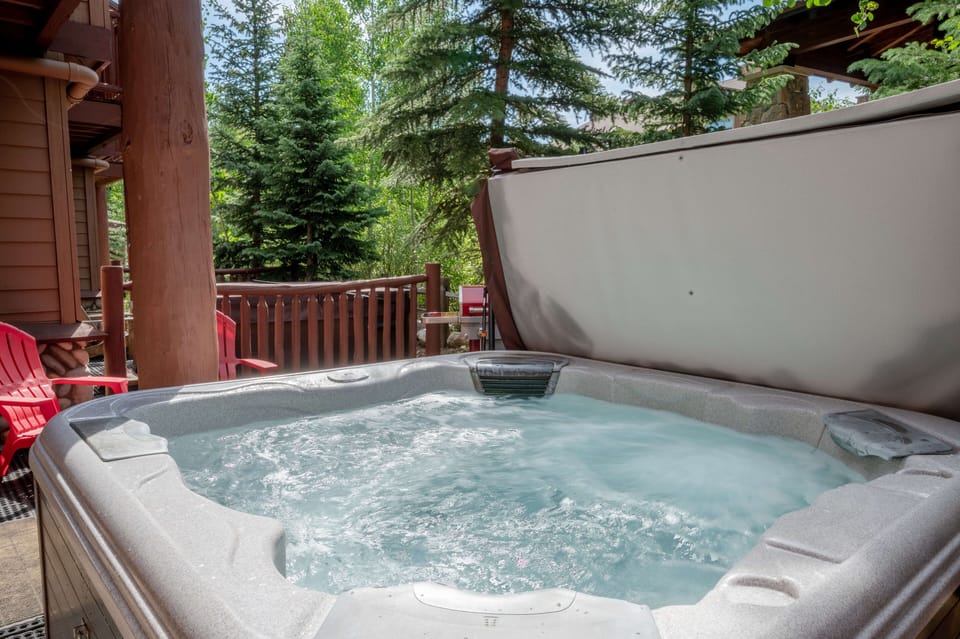 Let your worries bubble away in the private hot tub on lower level