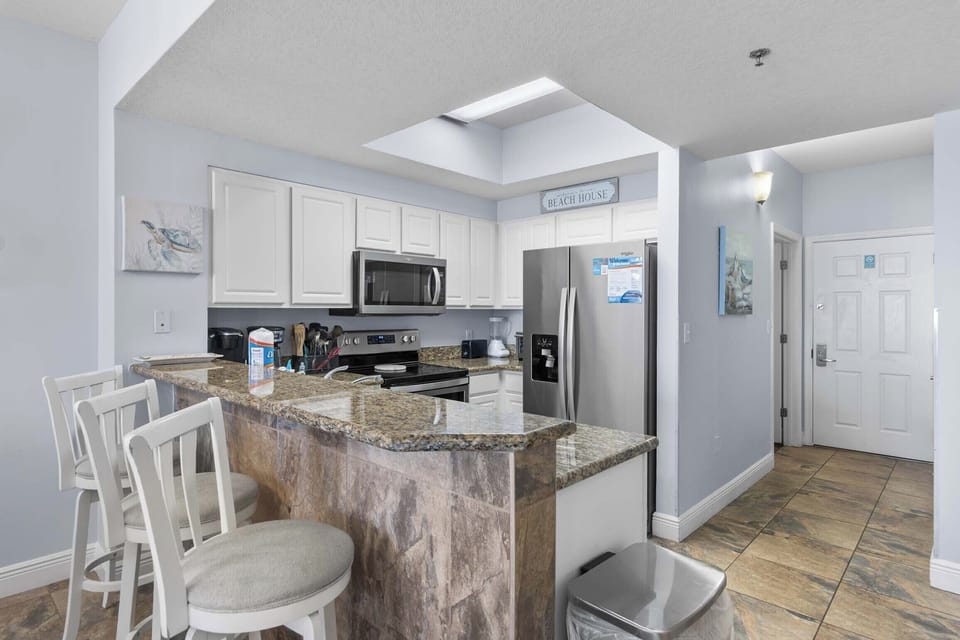 Kitchen with eat-in bar seating