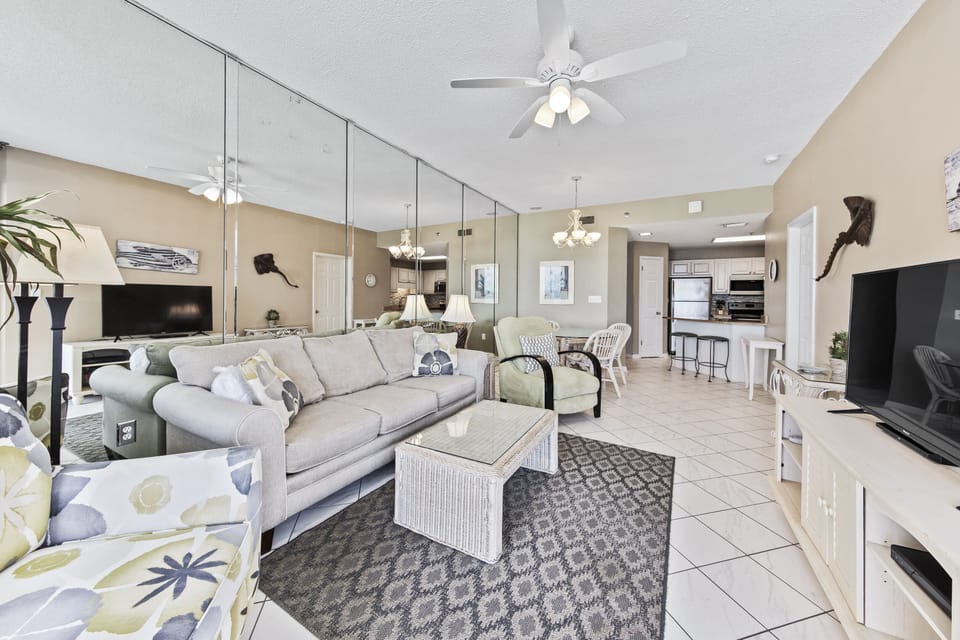 Spacious Living Area offers a Queen Size Sleeper Sofa, Access to the Balcony and Fantastic Views