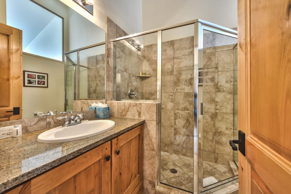 Master Bath with Dual Sinks and Tile Shower