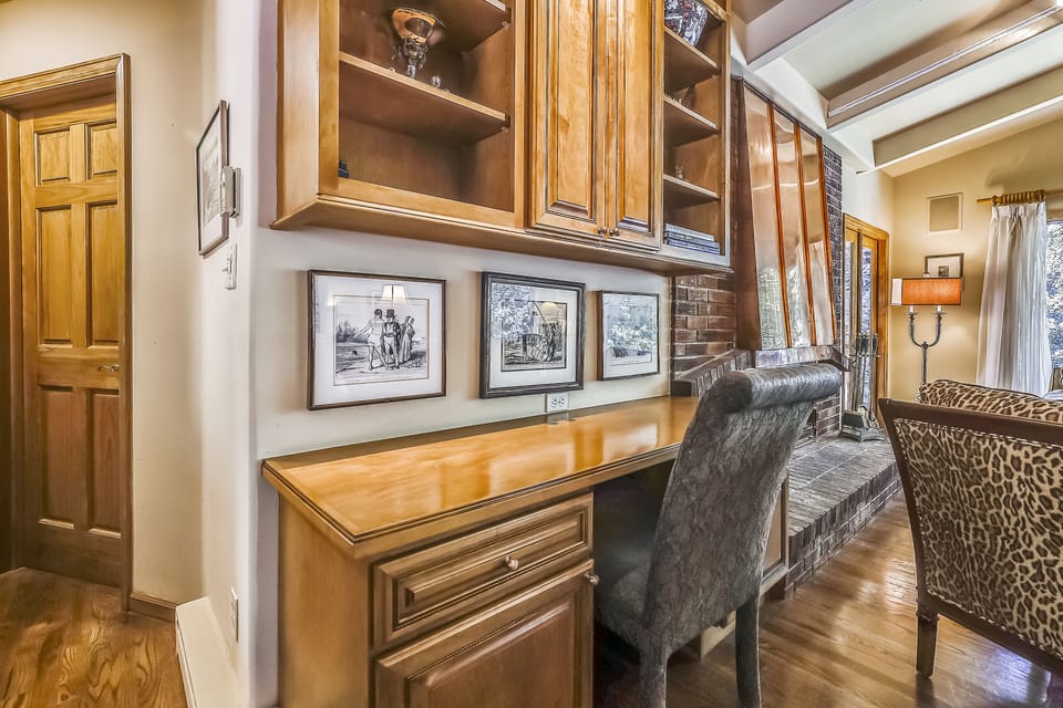 Desk area in upstairs living area, and bedroom hall entrance