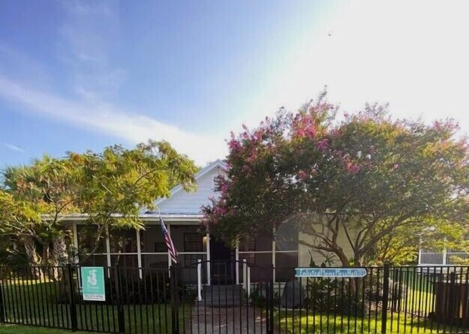 Side entrance to home - View of house from street parking.