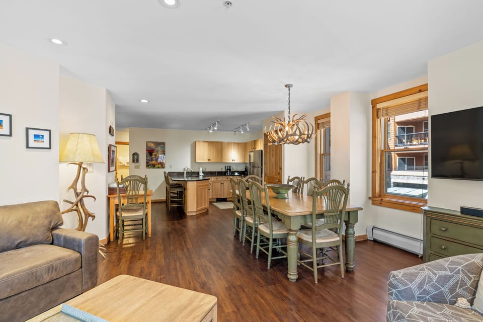 Unwind in your spacious open-plan retreat with gleaming hardwood floors, full kitchen, and cozy living space perfect for memorable meals.