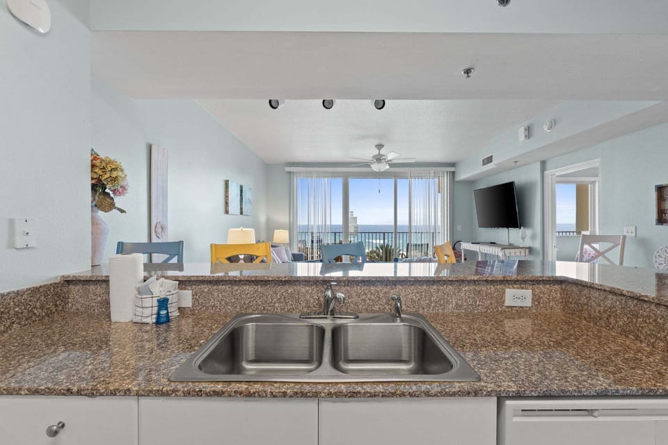 Fully Stocked Kitchen with Bar Seating
