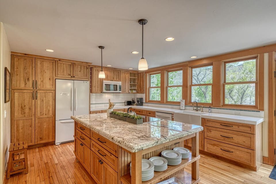 Enjoy the chef inspired kitchen with modern appliances and views of the River