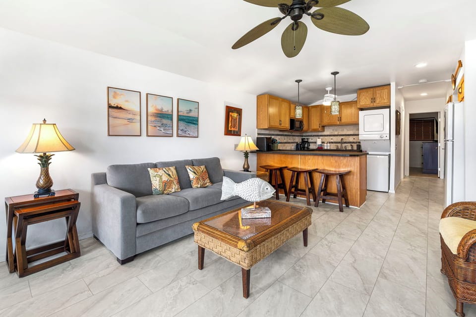 Living Area with Sofa and view into Kitchen