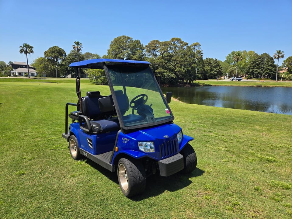 4-Seat Golf Cart Included
