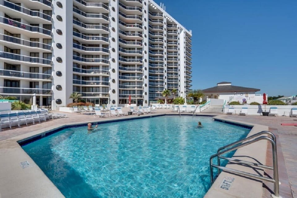 Surfside's pool deck is so spacious! Enjoy the heated pool, 2 hot tubs, & more!