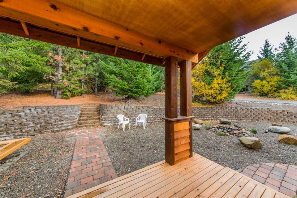Ridge Crest Chalet - Looking out at the Fire Pit from the back deck.