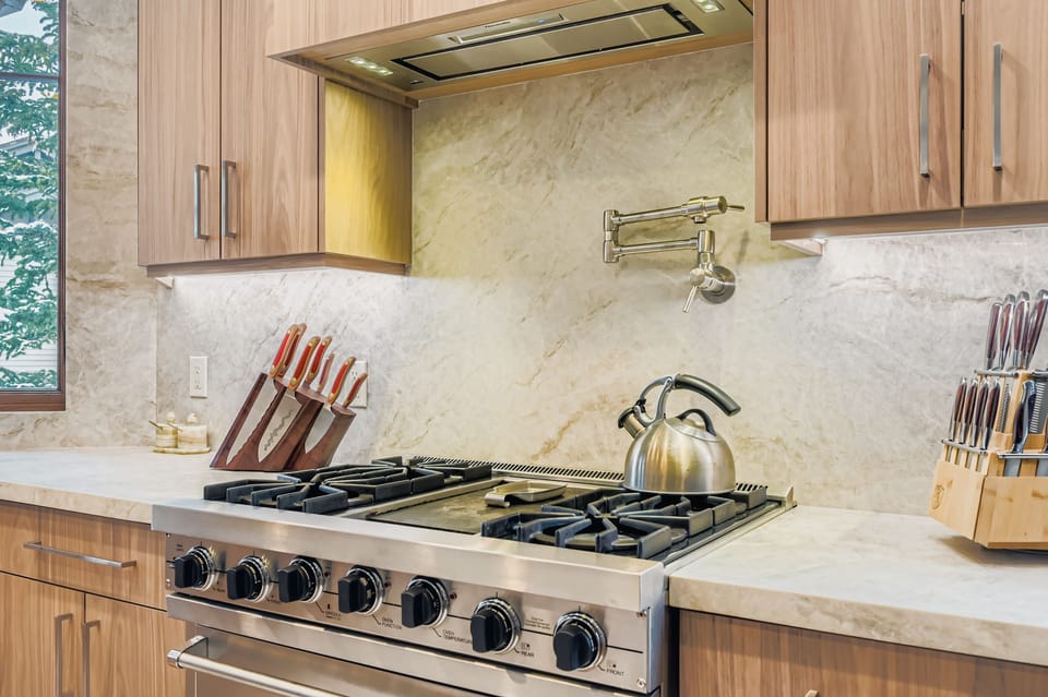 Your gourmet kitchen features premium gas cooking with professional-grade appliances and elegant marble countertops for all your culinary adventures.