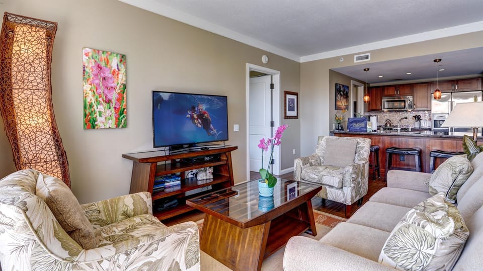 Featuring a smart TV and elegant furnishings