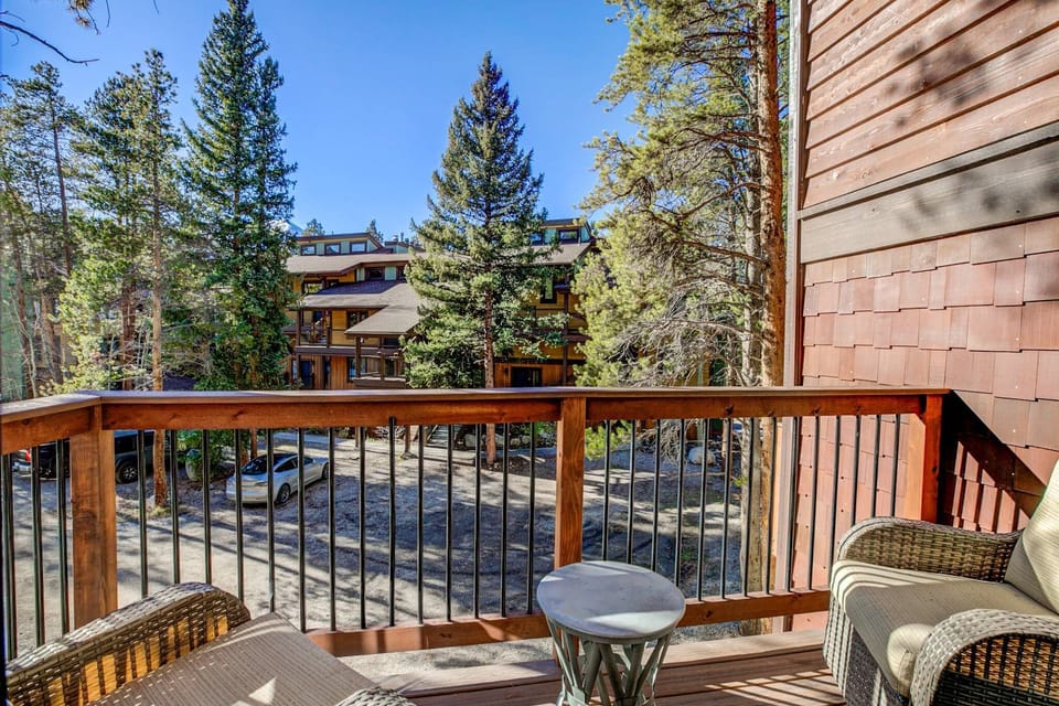 A step-out balcony with two chairs offers a lovely spot to take in the fresh mountain air.
