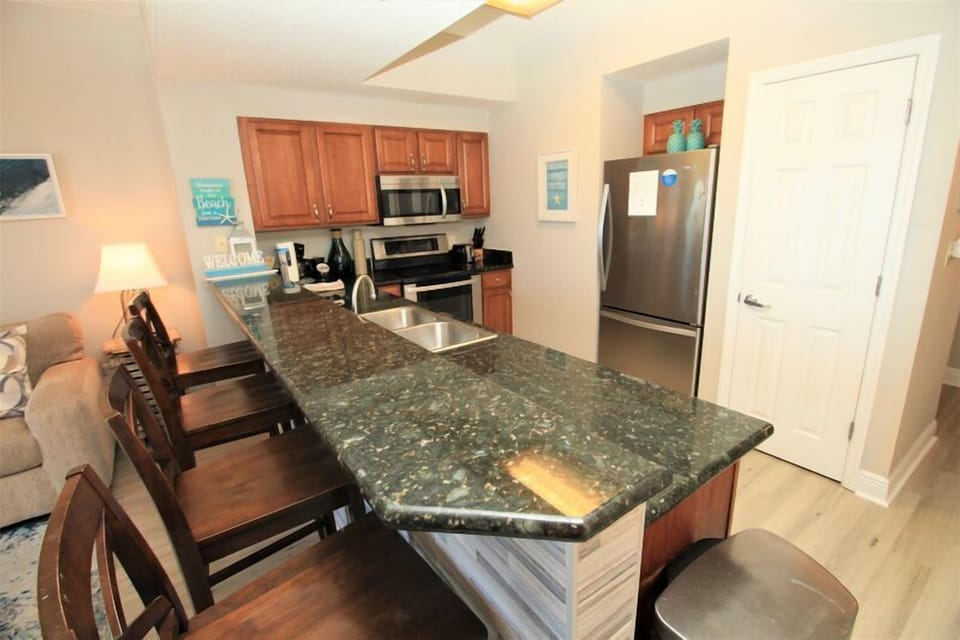 Granite countertops and stainless appliances in the kitchen