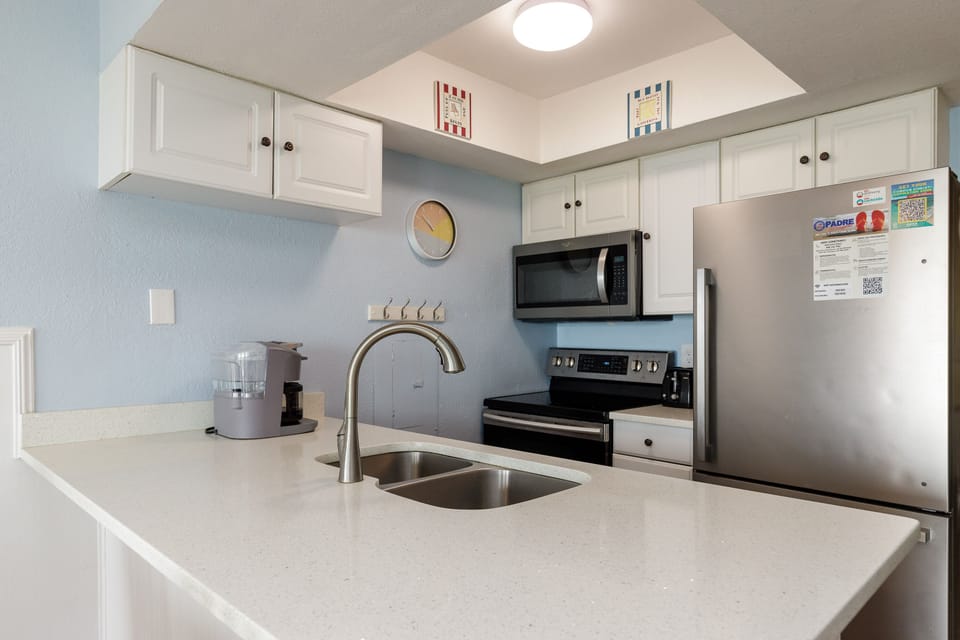 Your fully equipped kitchen features stainless steel appliances, granite countertops, and all the essentials for preparing meals during your stay.