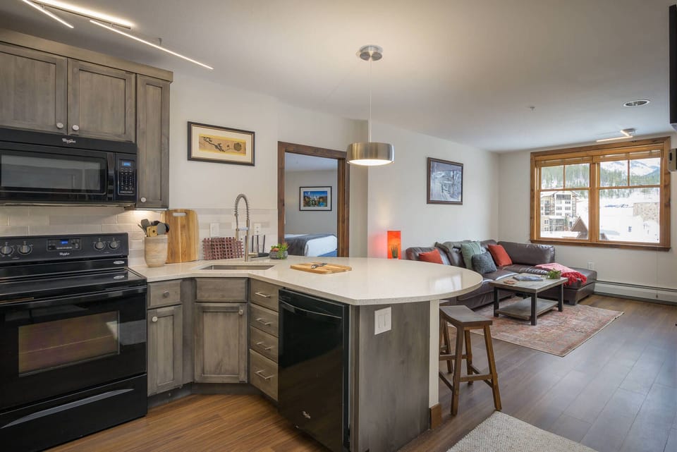 The living room flows into the updated kitchen