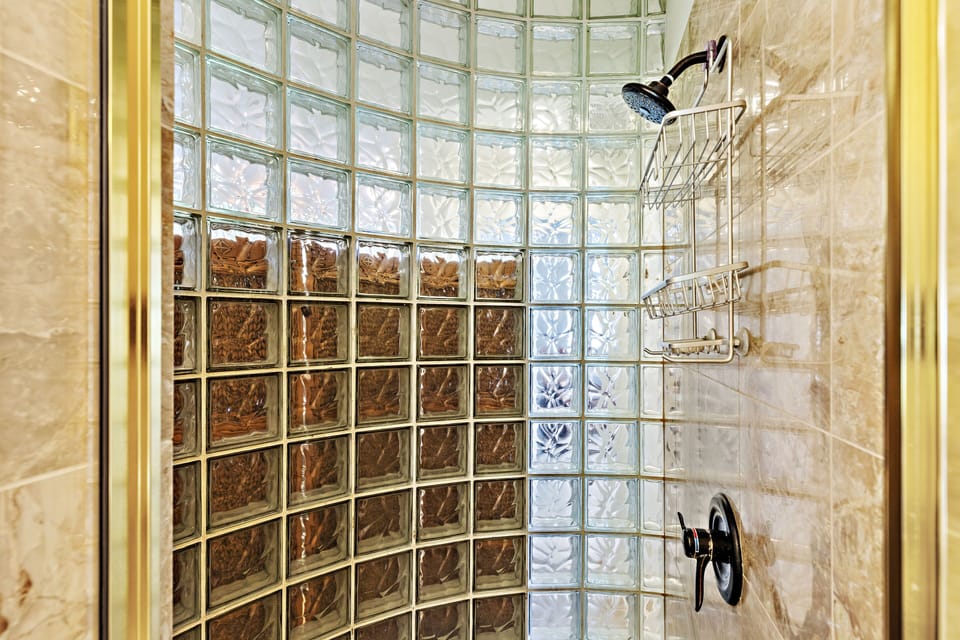 Textured glass is visible from the living room