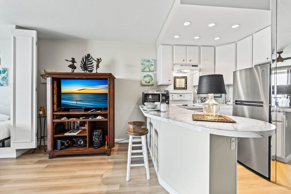 Bright kitchen with bar seating