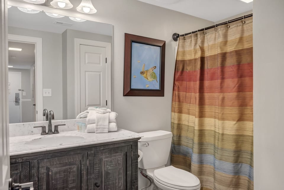 Full Guest Bath has Custom Cabinets
