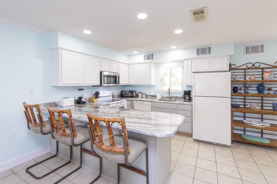 Kitchen with bar top seating