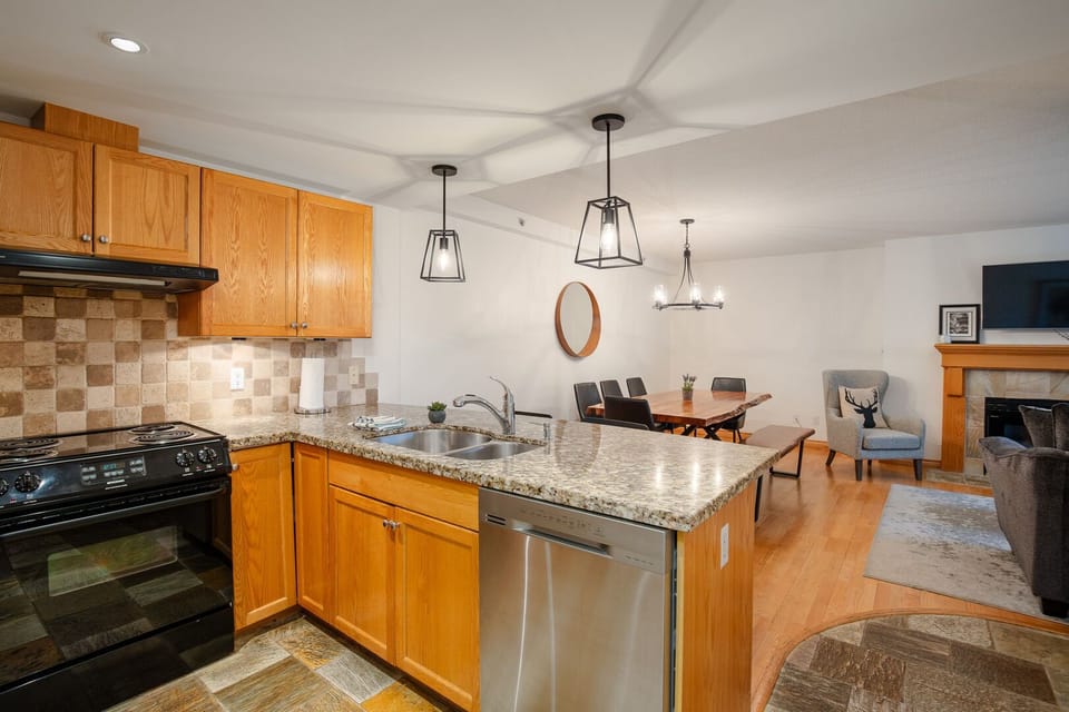 Whip up meals with ease in the fully equipped kitchen with stainless steel appliances.