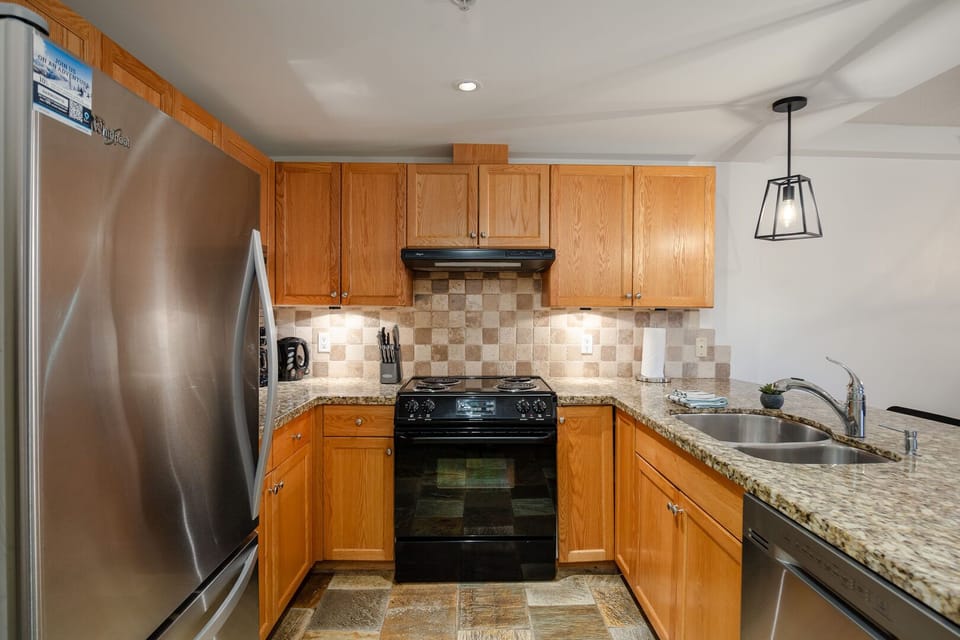 Sleek cabinetry and ample counter space make cooking a breeze.