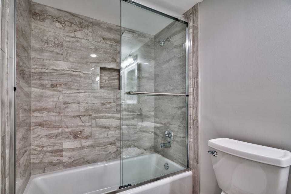 Bathroom, glass sliding door for tub/shower