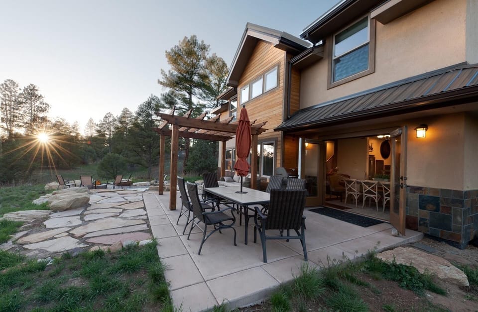 Outdoor living space - Dining Table, BBQ, couch and gas fire pit