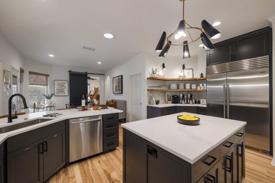 Open kitchen makes conversations between rooms very easy.