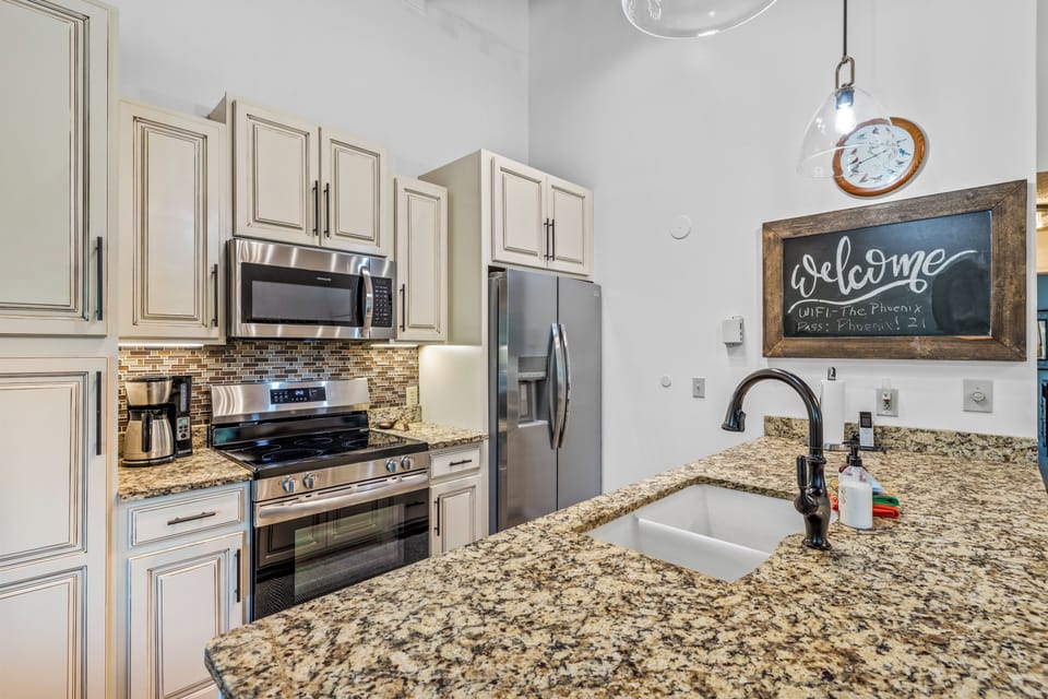 Your fully equipped kitchen welcomes you with granite countertops, stainless steel appliances, and all the essentials for cooking memorable meals during your stay.