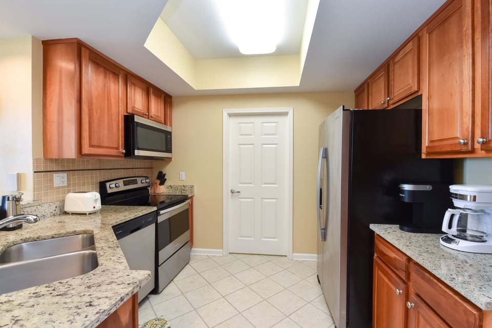 Silver Beach Towers West 505- Kitchen with Washer and Dryer