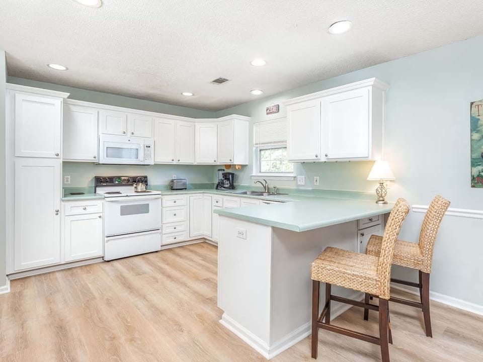 Kitchen with counter seating for 3