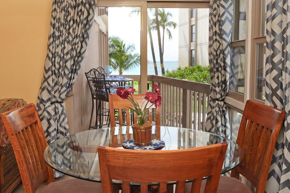 Seating area with a view of Sugar Beach and the Pacific ocean.