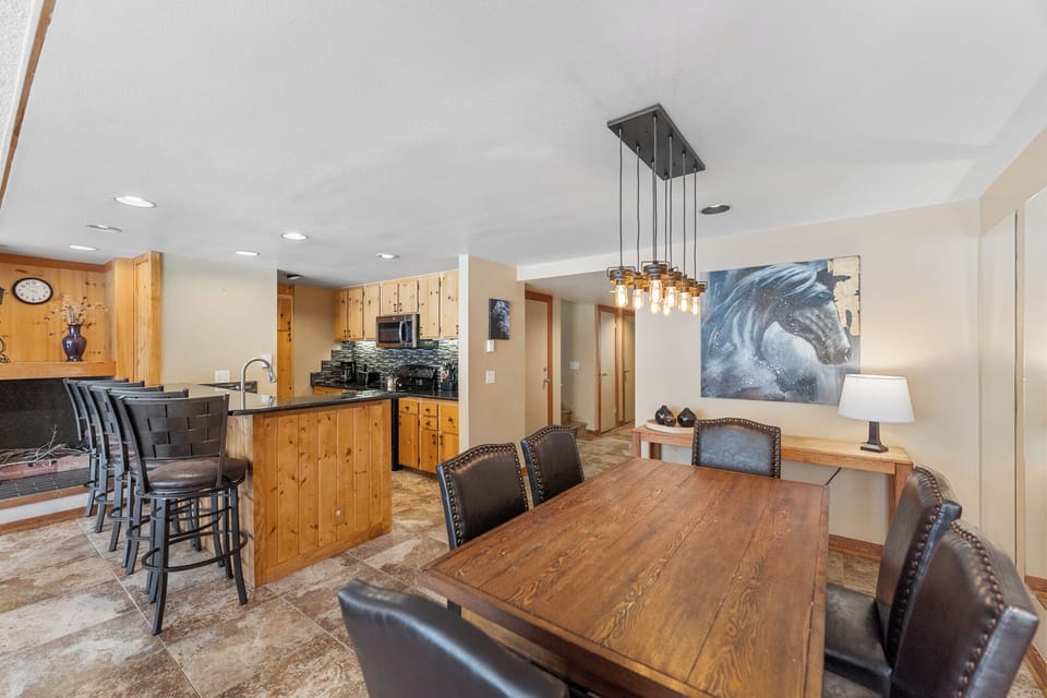 Your elegant dining space flows seamlessly into the modern kitchen, perfect for hosting memorable meals with loved ones.