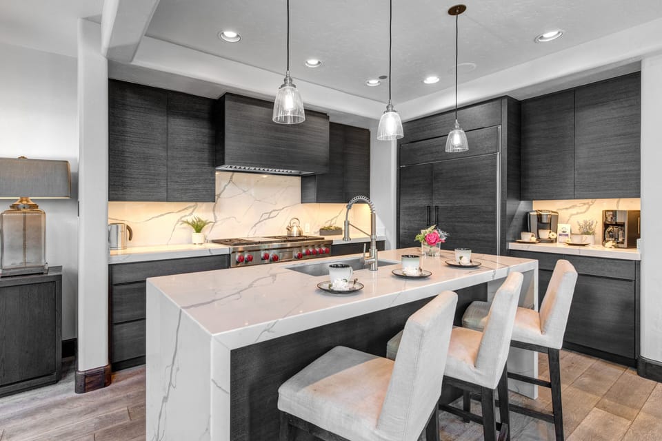 Modern Kitchen with Marble Counter Tops, Wolf Appliances and Sonos Sound.