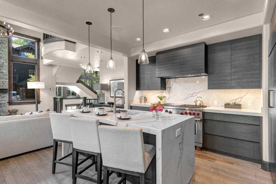Modern Kitchen with Marble Counter Tops, Wolf Appliances and Sonos Sound.
