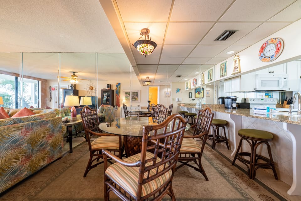Seating for 4 at the table and additional seating at the bar.