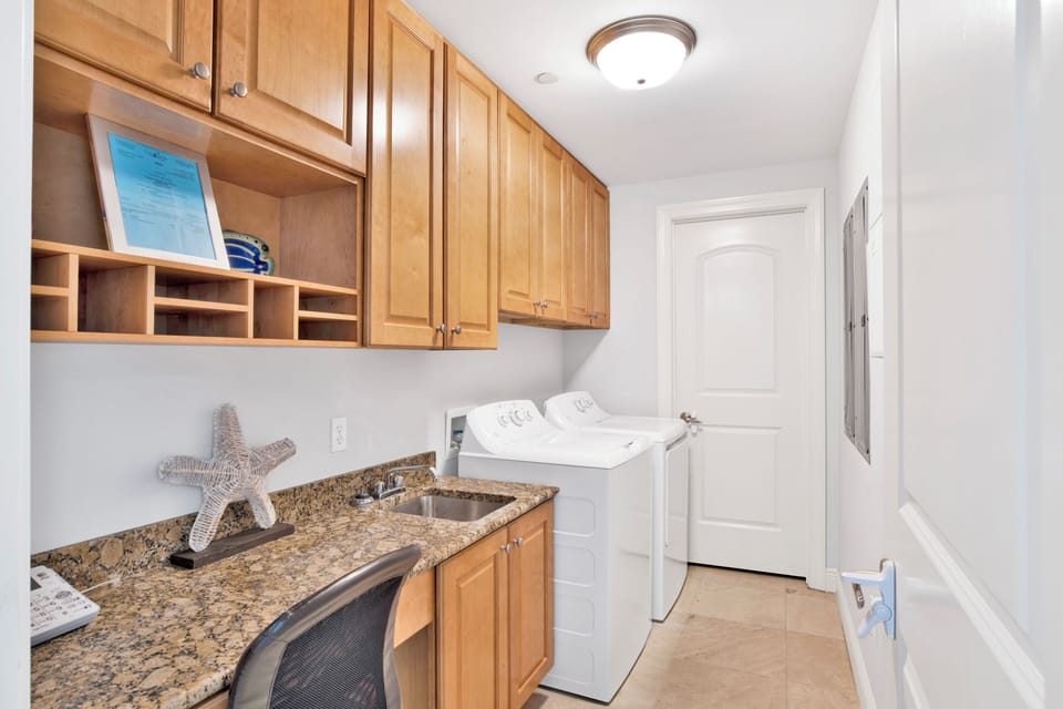 Laundry room and desk area