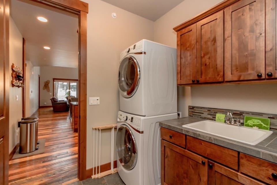 Icing on the Cake in Suncadia - All Seasons Vacation Rentals - Laundry room leading to the garage game room.