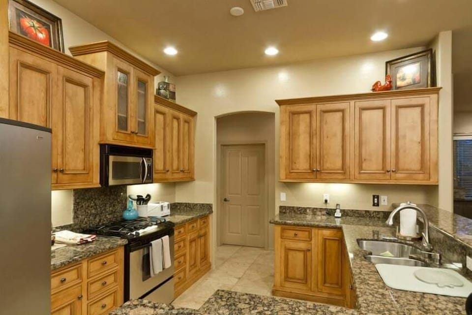 Lots of counter space surrounding stainless steel appliances