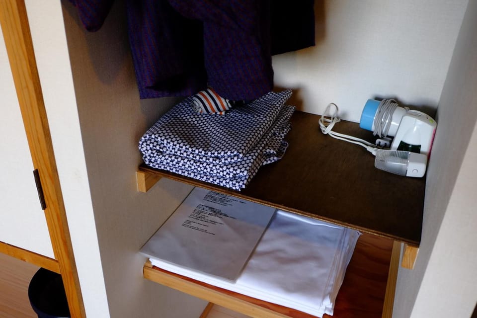 Desk, laptop workspace, iron/ironing board, rollaway beds