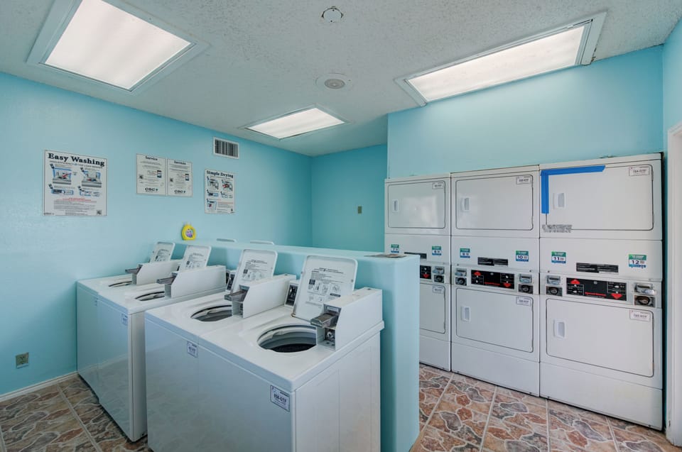 Your laundry needs are covered with multiple washing machines and dryers in this bright, clean facility.