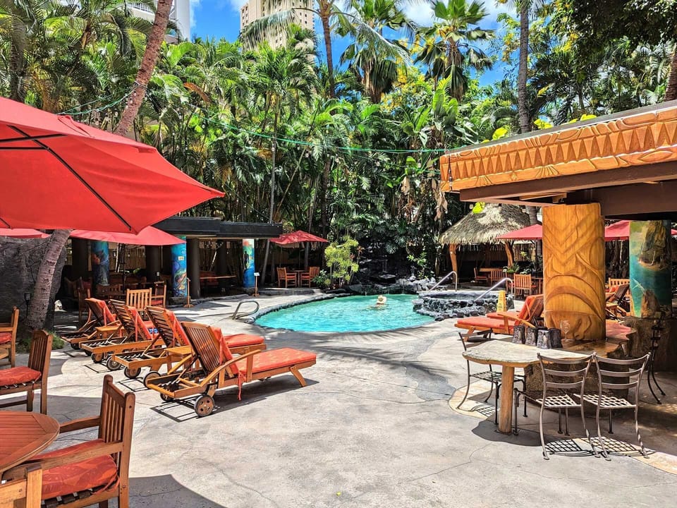The pool area provides a secluded retreat for relaxing and socializing.