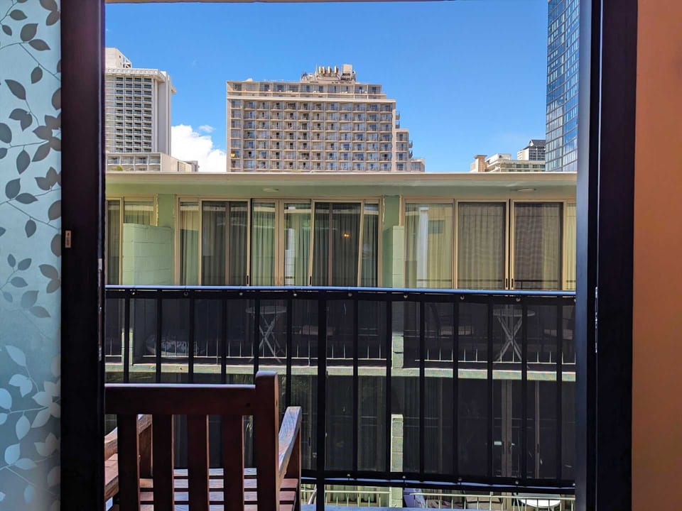 There is a skyline view from the lanai over the top of the small hotel next door.  For your convenience, we've installed a privacy film on the lower portion of the sliding glass door, so you do not need to keep the curtains closed.  (Hopefully, you'll be out exploring the island anyway!)