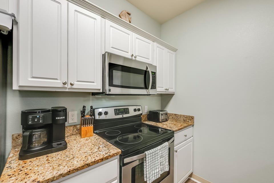 Your fully equipped kitchen features granite countertops, stainless steel appliances, and everything you need to prepare delicious meals during your stay.