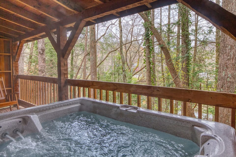 Leather and Lace - Covered hot tub with river sounds in Gatlinburg, Tennessee. Reserve today!