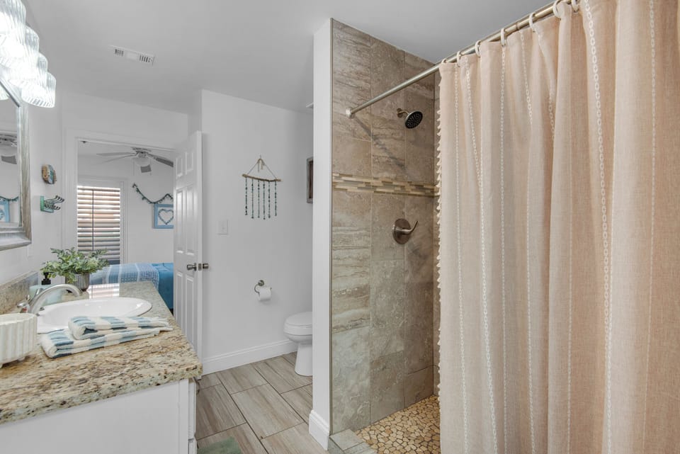 Full bathroom with walk-in shower