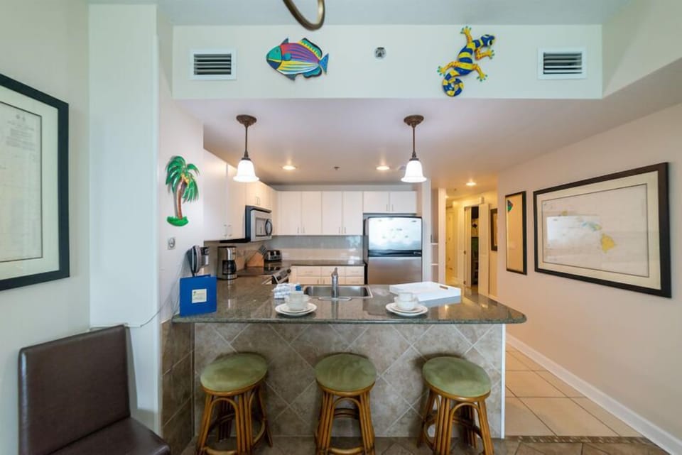 The open floor plan helps you entertain while cooking a meal for your family/friends
