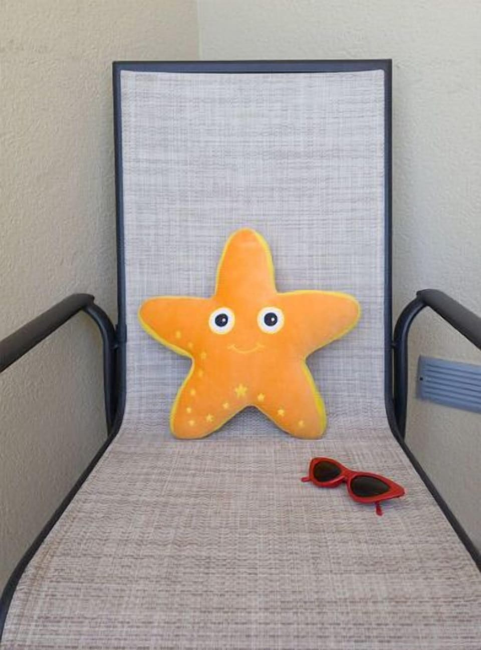 Sandy Starfish, our mascot, loves the balcony!