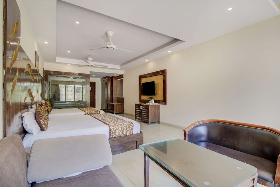 Family Double Room, Multiple Beds | Minibar, in-room safe, rollaway beds, bed sheets