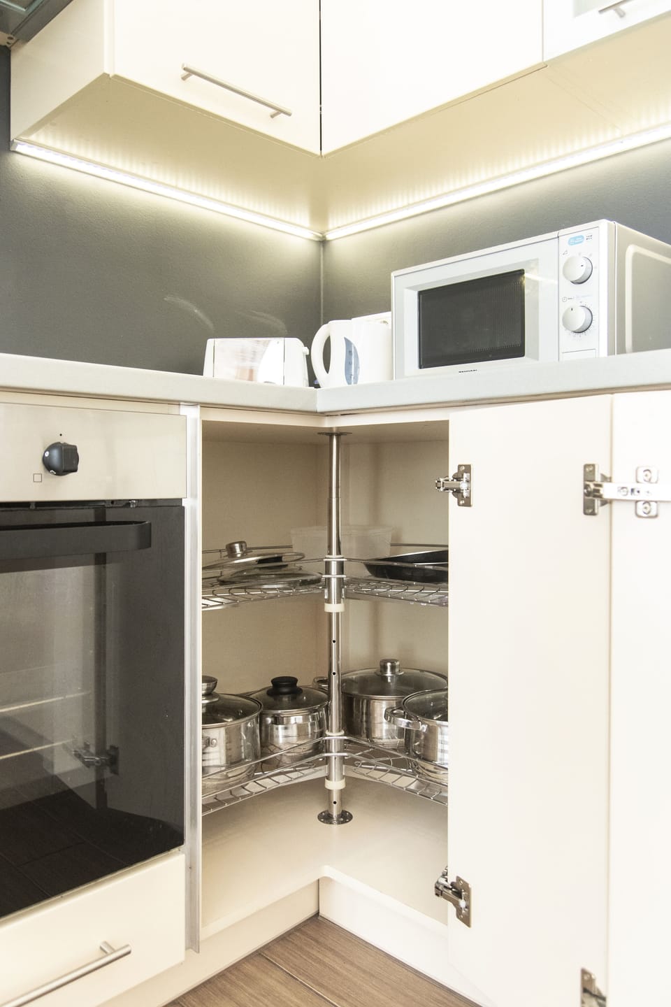 Deluxe Apartment | Private kitchen | Fridge, highchair, dining tables